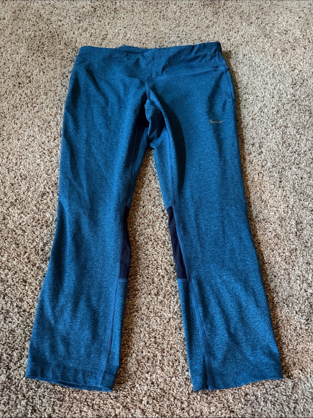 Nike Teal women’s cropped leggings